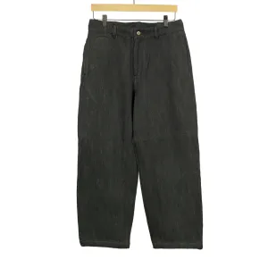Flat front trousers in black slubby handwoven cotton denim