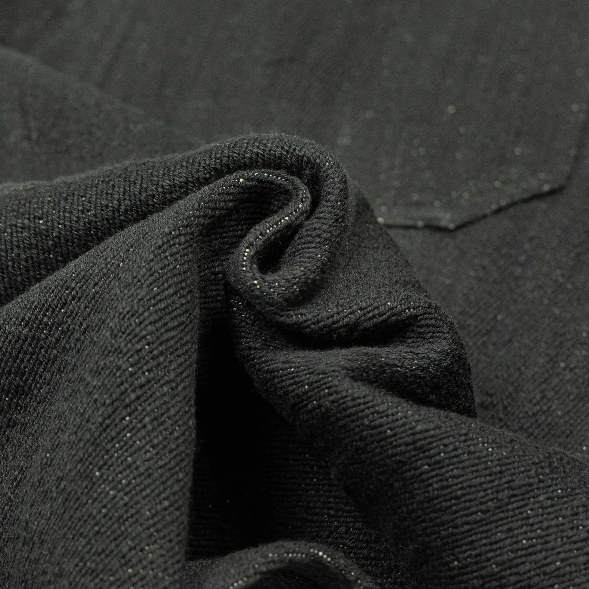 Flat front trousers in black slubby handwoven cotton denim