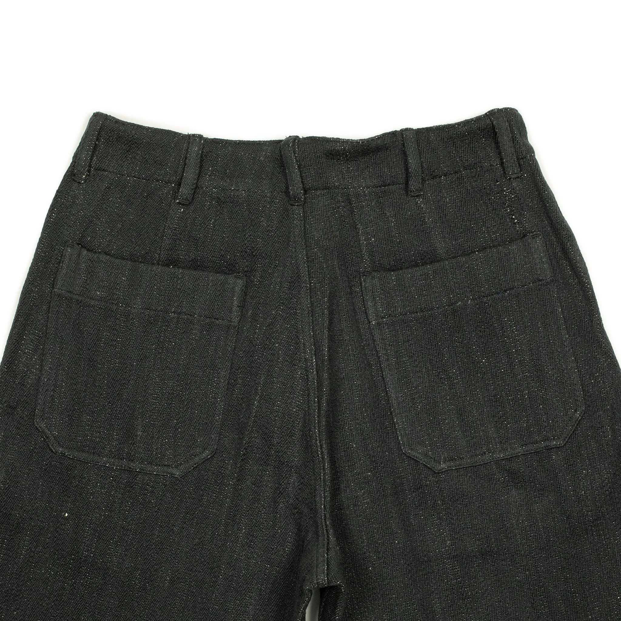 Flat front trousers in black slubby handwoven cotton denim
