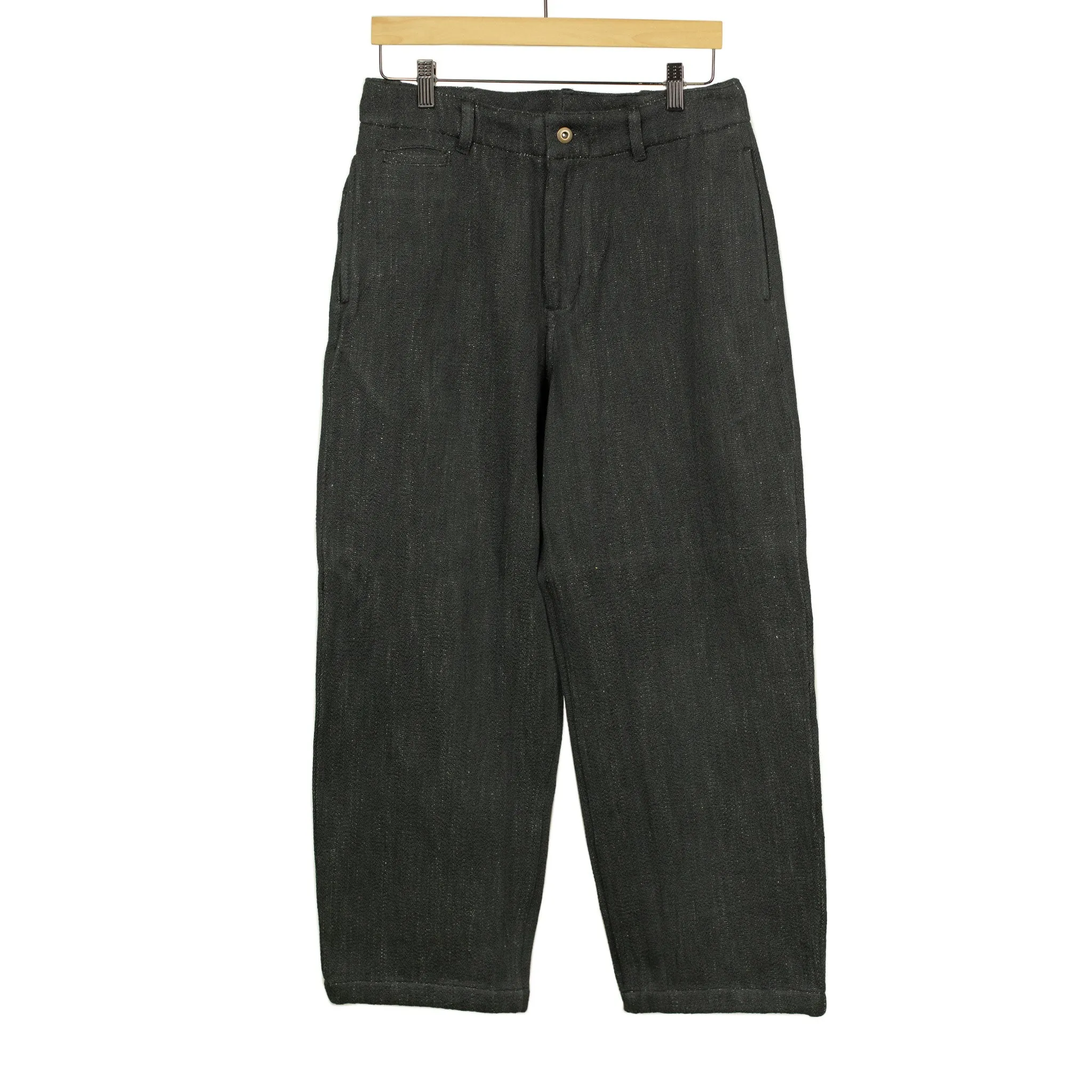 Flat front trousers in black slubby handwoven cotton denim