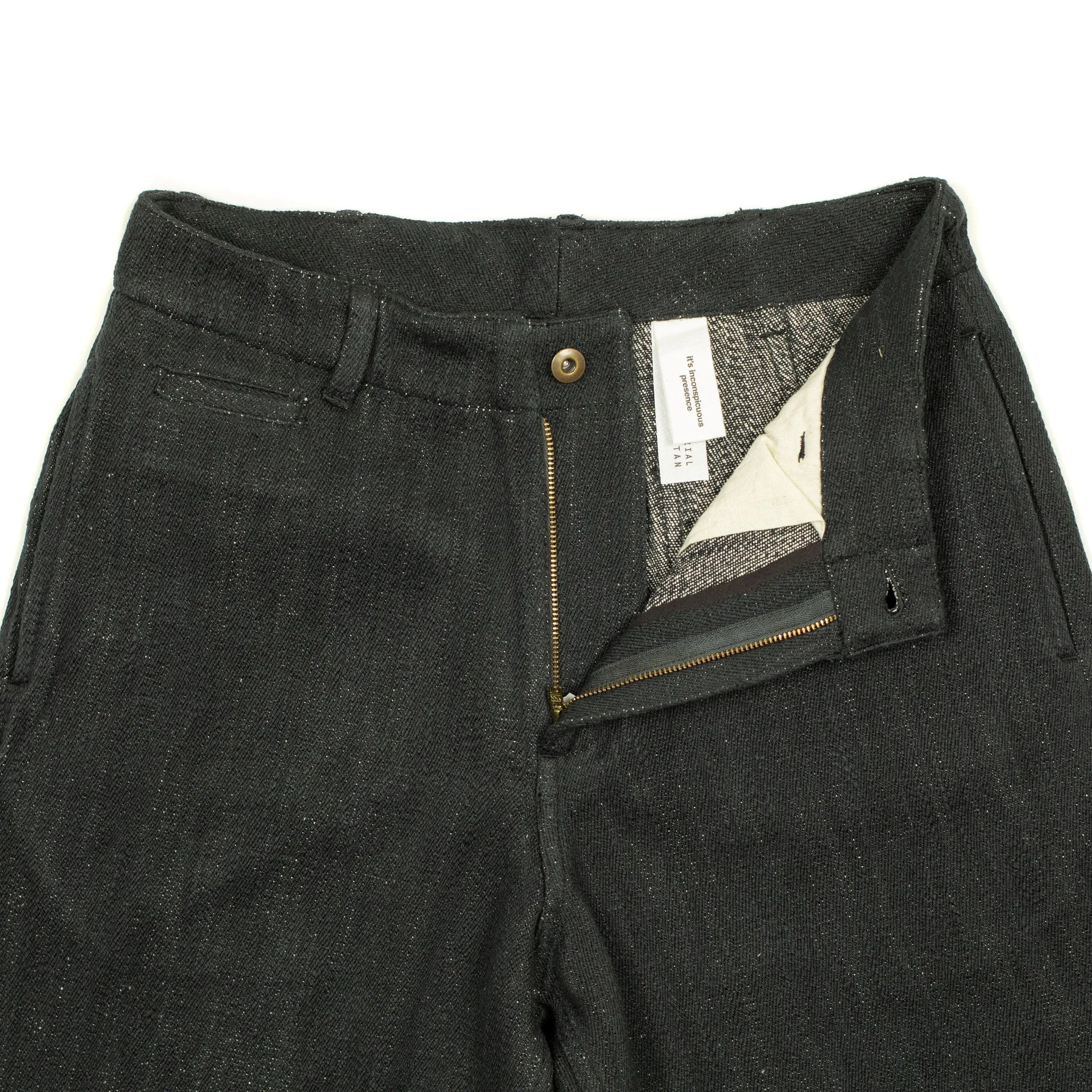 Flat front trousers in black slubby handwoven cotton denim